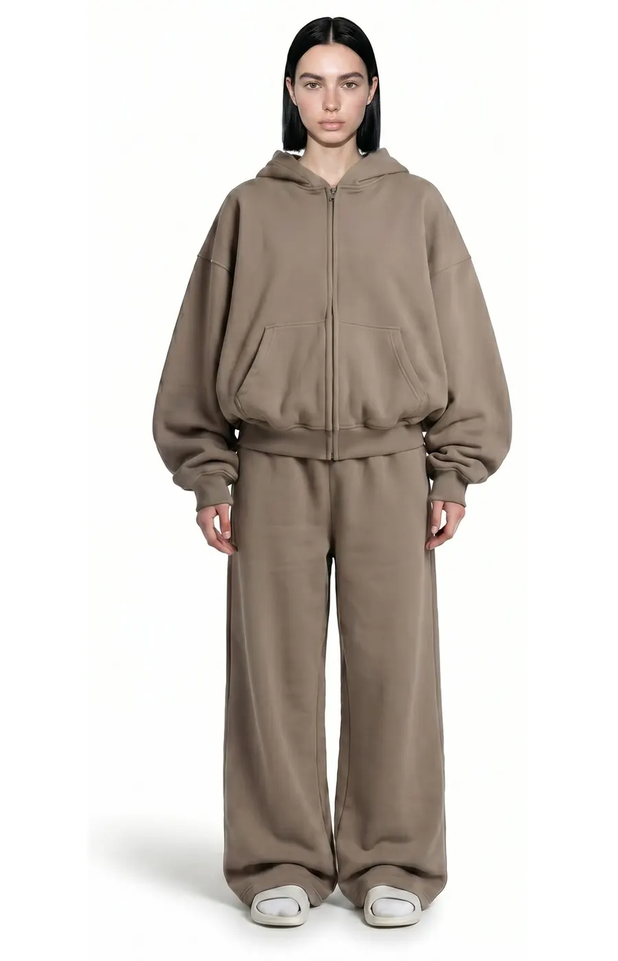 Model wearing Ghost 44 Factory taupe zip hoodie and joggers, front view