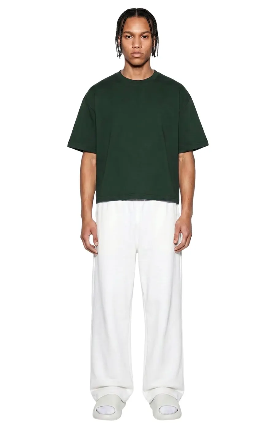 Model wearing Ghost 44 Factory forest green cropped tee, front view