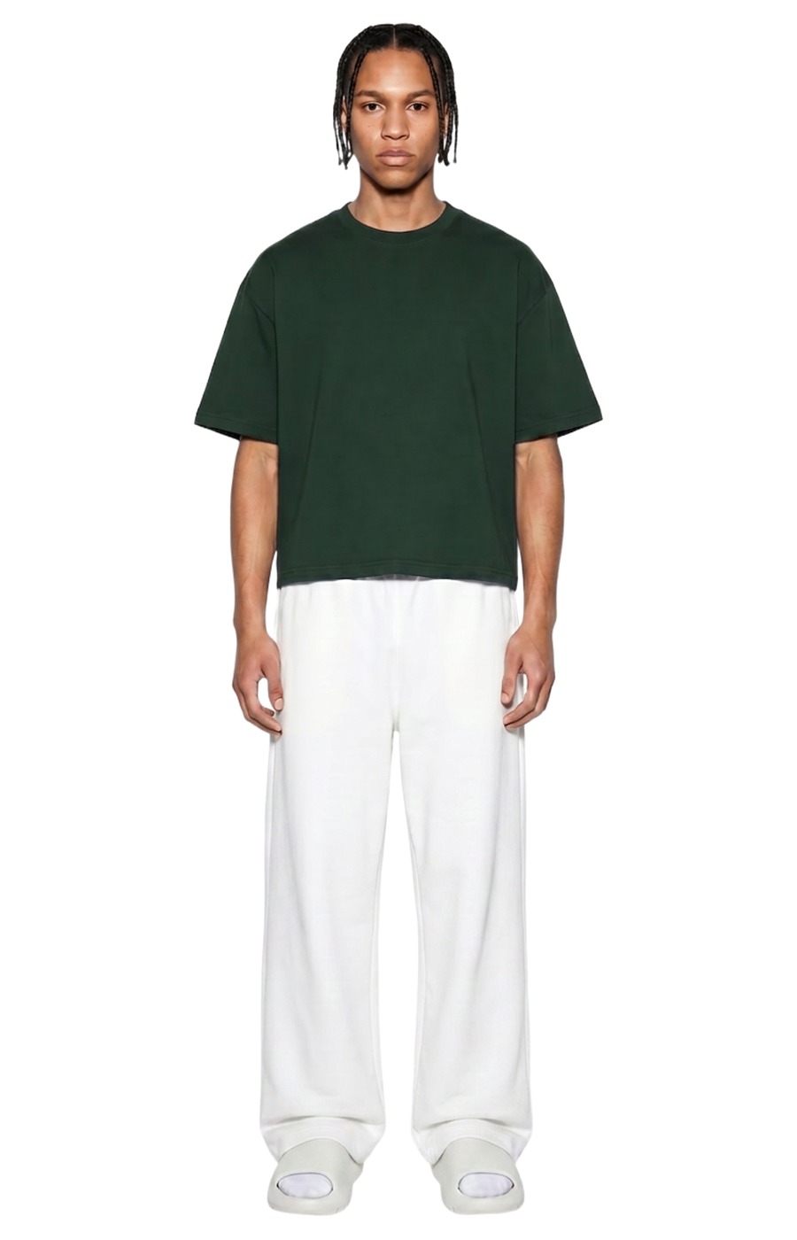 Model wearing Ghost 44 Factory forest green cropped tee, front view
