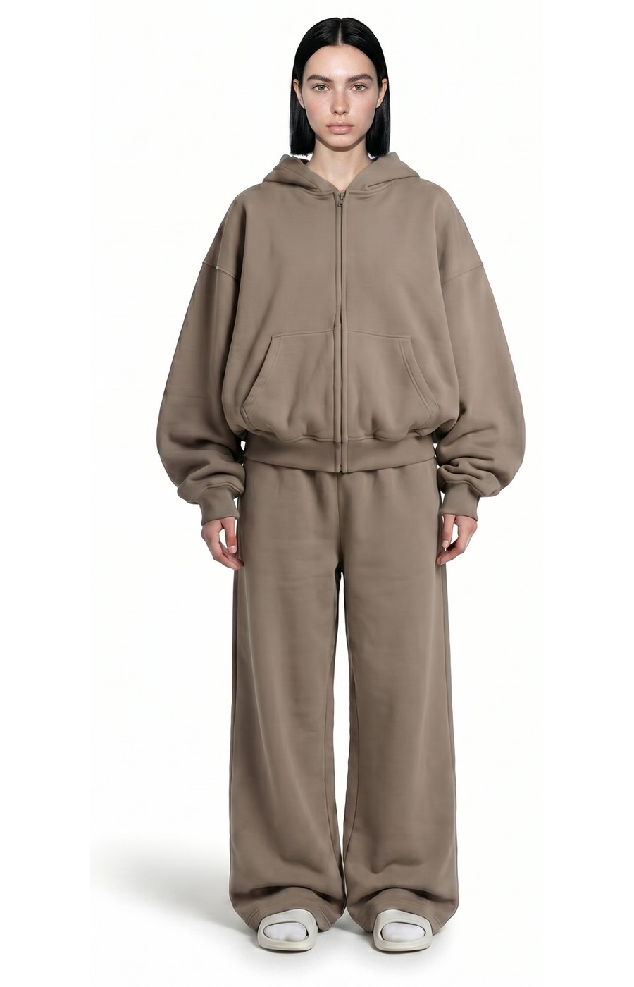 Model wearing Ghost 44 Factory taupe zip hoodie and joggers, front view